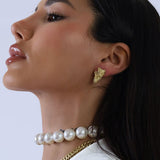 SPARNAS GOLD FEATHER EARRINGS